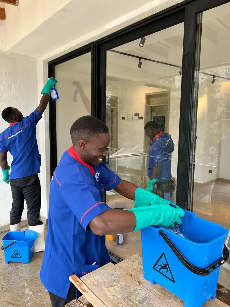 Professional post-construction cleaning team at work